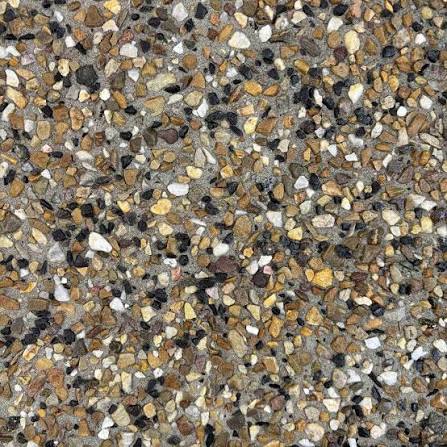 Exposed aggregate finish sample — amber and brown pebble mix
